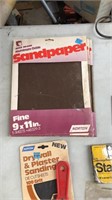 Misc.- saw, sand paper. Stanley cordless charger,
