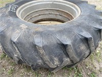 20.8x38 bias tire on rim, full of air