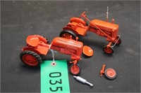 2 - Plastic Cub Tractors