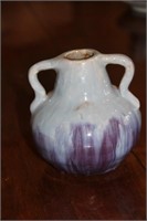 Hand made double handle vase. Signed