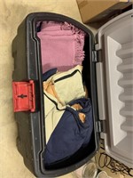Assorted Quilts and Rubbermaid Chest