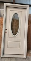 EXTERIOR DOOR W/ DECORATIVE OVAL WINDOW