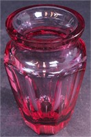 A 4 1/2" high amethyst glass vase marked Moser