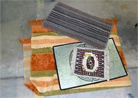 PILE OF THROW RUGS