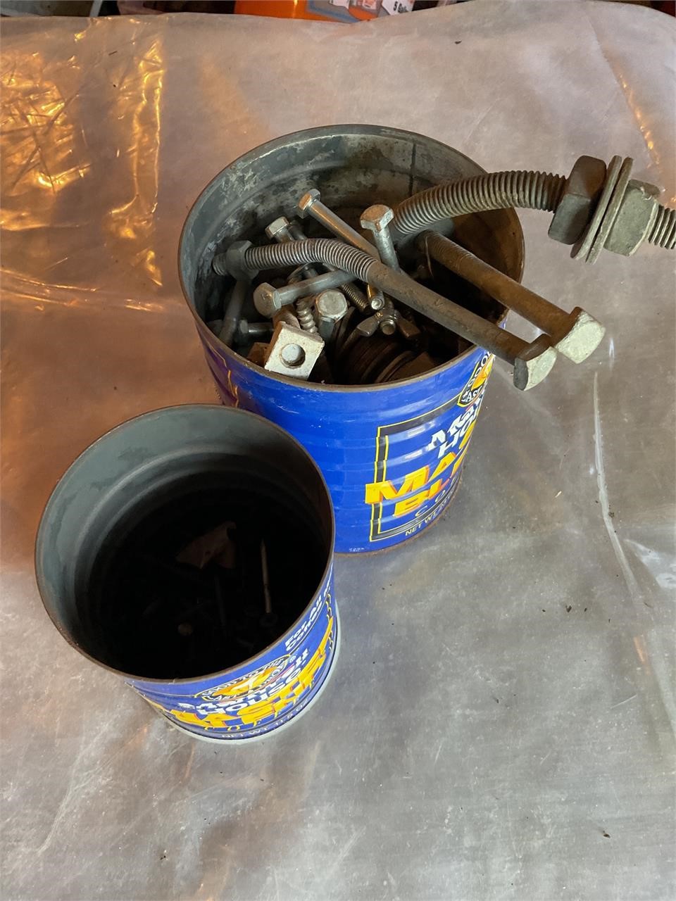 Coffee containers full of heavy duty screws etc