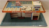 Tin service station toy