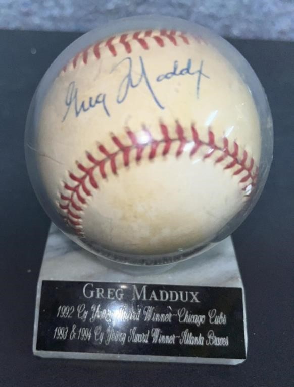 Greg Maddux Autograph Baseball on Stand