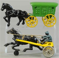 TWO SMALL HORSE DRAWN TOYS