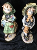 Two porcelain figurines from Italy.  11”