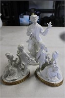 3 White Figurines