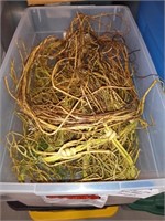 Container full of faux twig