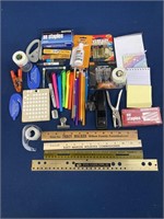 Assorted items including Stapler, pens, pencils,