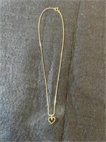 14K Gold Necklace With Heart Containing a Clear