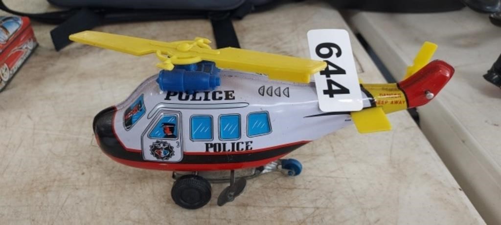 VINTAGE WIND UP TIN POLICE HELICOPTRER