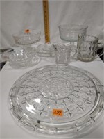 Clear glass cake plate, 2 small pitchers,