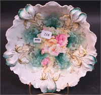 A floral bowl marked RS Prussia and decorated