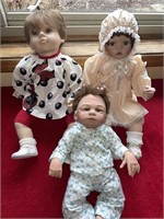 Three collectors dolls