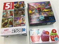 3 boxes of puzzles