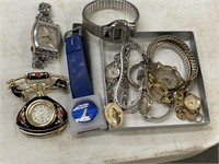 9 OLD WRISTWATCHES & 1 CLOCK PIN