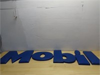 Mobil gas letters sign. Plastic.