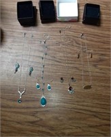 Four pieces costume jewelry earrings and necklace