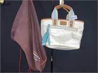 CREAM COLORED SMALL COACH TOTE WITH BLUE AND