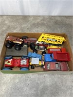 Toy tractors, cars, and trucks