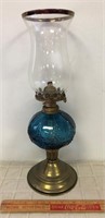 OIL LAMP WITH UNIQUE COLORED GLASS BASE