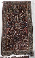 Semi antique wool pile scatter rug 48" L x 26" W