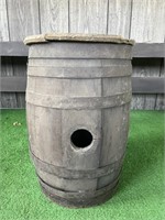 Small rustic whiskey barrel with broken lid