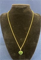 Avon Goldtone necklace with Jade colored pendant