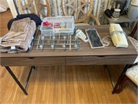 Wooden desk, metal legs, two drawers, towel,