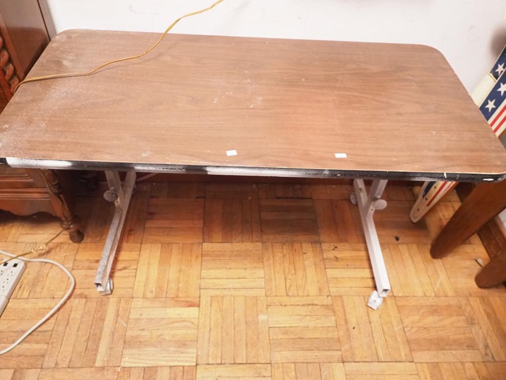 49" long adjustable rolling table, 24" deep