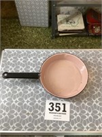 Pink enamel ware pan