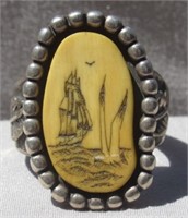Sterling silver ring with scrimshaw artwork.
