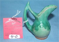 Artist signed glazed over earthenware pitcher