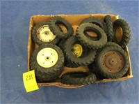 Box of toy tractor tires