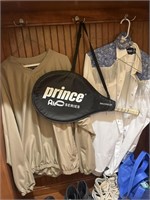 Tennis racket with men’s and women’s shirt