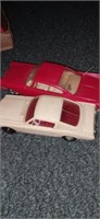 Two factory plastic model cars