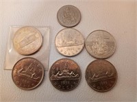 Six Canadians Dollars and 1 50 cent piece