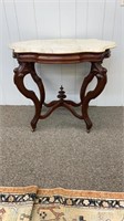 Victorian walnut table with a marble top
