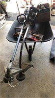 Wheel barrow w/tools & weed trimmers