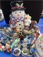 COLLECTION OF SNOWMEN AND SANTA CLAUS FIGURINES