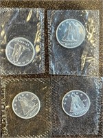 Set of four Canada dimes