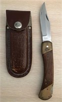 D - FOLDING KNIFE W/ LEATHER CASE (B41)