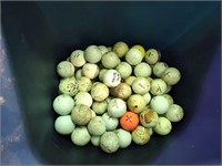 Used golf balls, waste bin