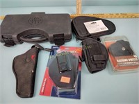 Pistol holsters and cases