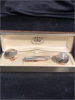 Swank gold colored tie clip and cufflinks