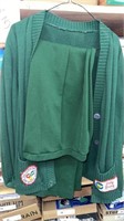 Woman’s green cardigan and slacks with Girl Scout