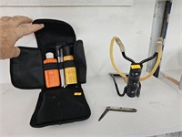 Gun cleaning kit, sling shot and pocket knife